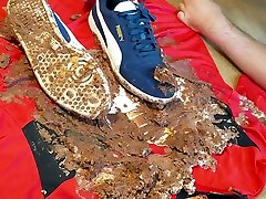 crushing a whole cake with blue puma sneakers