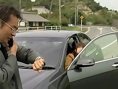 Asian babe enjoys lust in the car