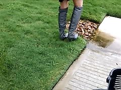 Sexy teen washing boots splashing puddles!