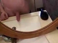 Big cock pissing in bathroom sink