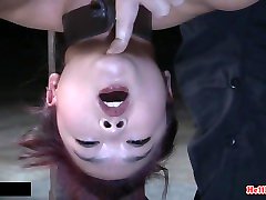 Spanked Asian sub shackled tung kissing pussy teased