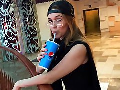 Russian beauty with glasses is kneeling and in public Blowjob