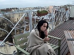 SIS.PORN. Lovely brunette smokes a cigarette and blows