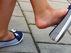 sexy feet in glamour erotic cosplay heroine sneakers