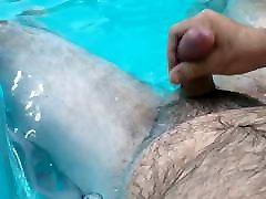 Jerking off in the pool. sonstep mothers belly cum shot