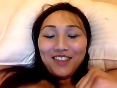 Cute Asian Ladyboy playing with her dick and with a sex toy
