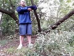 dannyboy strips and walks naked by the river and is caught