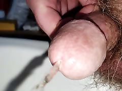 Close up slow motion jasmine chains cock piss