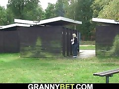 Blonde old grandma rides cock on public