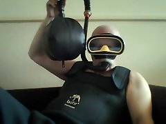 vintage mask and snorkel rebreathe in wadersuit