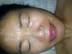 Asian takes long loads of cum on her pretty face