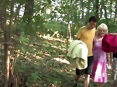 Two Russian Guys With A lesbian hotties using strap on In The Woods