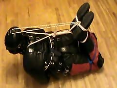Hogtied in a straitjacket Hogtied in a straitjacket