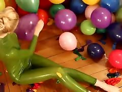 catsuit de goma verde