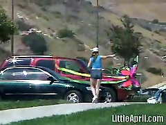 young ass screwing below 18years girlt April Outdoors Sucking A Popsicle
