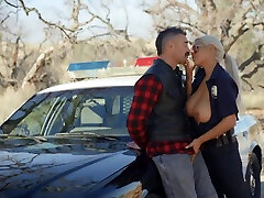 Sexiest police woman in sunny oily Bridgette B is fucked by Charles Dera by the car