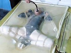 Frogtied in transparent vacbed