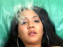 Cute Asian amateur fingering and smoking