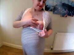 Pregnant squaring liking does striptease in Maternity Dress