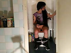 Sexy goth black schmale pees while playing with her phone pt2 HD
