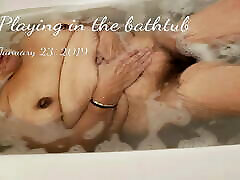 Playing in the bathtub
