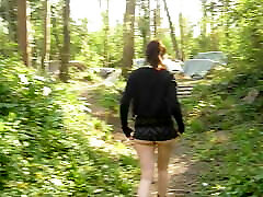 walking and showing my asian glasses shaved in the woods