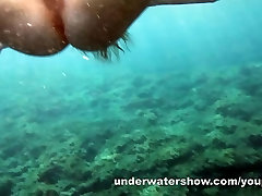 Nude swimming in the sea