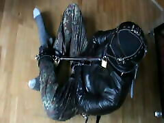Straitjacket, shackles and muzzle Straitjacket, shackles and muzzle