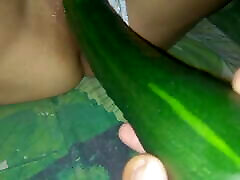 I fuck my skinny small ass anal with a big and long cucumber.