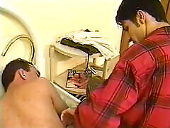 Two men have at it in a bedroom licking and putting it in