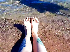 bikini love Nika enjoys the salty sea on her feet.