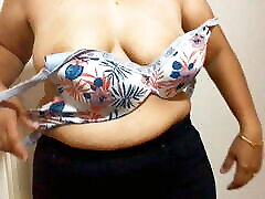 Beautiful Curvy Girl unhooks bra in style