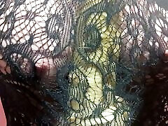 Titjob through fishnets dress