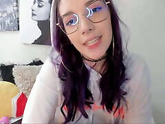 Colombian with purple hair and an alternative look tries to seduce you by shaking her big fat ass in your face