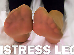 Mistress feet in soft nylon napal wwwcom is resting on the bed
