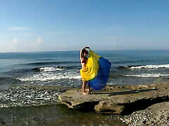 Dancing on Mediterranian Sea Beach with Yellow-Blue Shawl