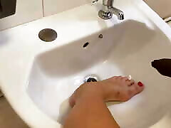 Nemo pisses all over my feet in a public hd porn sone sink