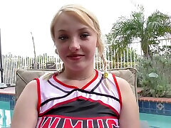 POV video of blonde cheerleader Dixie Lynn sucking a large dick
