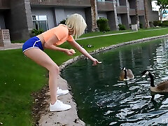 freak clit blonde cutie Kiara spreads her legs in outdoors to tease