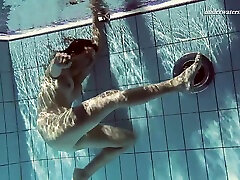 Russian dawn zimniak model teen showcasing her shaved pussy in pool