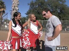 Two naughty cheerleaders in pigtails fuck the coach