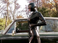 Sexy slut in latex suit toy fucking her pussy in fetish film