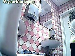 Lovely white lady in black capping booty and pantyhose pisses in the toilet