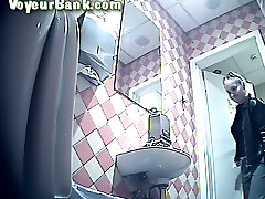 White chick in leather jacket and black cg porn image pisses in the toilet room