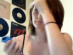 Dirty hazel haired white chick shows her small tits on webcam