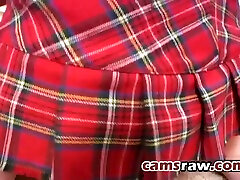 College babe in red plaid skirt is testing her new dildo on cam