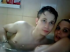 Teen masterbating on mom couple in the bathtub making out and teasing each other