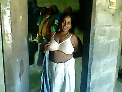 Naughty amateur Indian man plays with huge saggy boobies of his wife