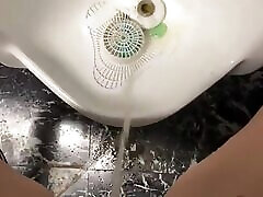 Pee in the men sherlyn chop toilet