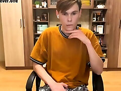 Good looking gay boy jerks off in front of webcam